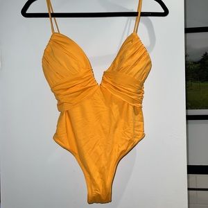 Brand new orange one piece swim suite from Zara